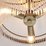 Close-up of Endon Beaumont 3 Light Semi-Flush Ceiling Light in brass, showing the central hub, three arms, glass rods and lit E14 lamp.