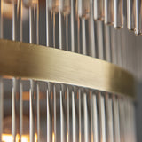 Close-up of the Endon Beaumont 21 Light Chandelier showing the brushed antique brass tier band and clear glass rods.