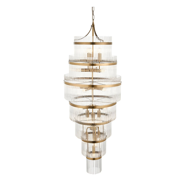Endon Beaumont 21 light chandelier in antique brass with multiple tiered rings of clear glass rods, suspended from a chain on a plain background.