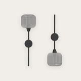 Blueberry Ribbed Glass Wall Light in grey, shown in two mounting orientations with round black wall plates, slim iron stems, and ribbed glass shades, on a plain background.