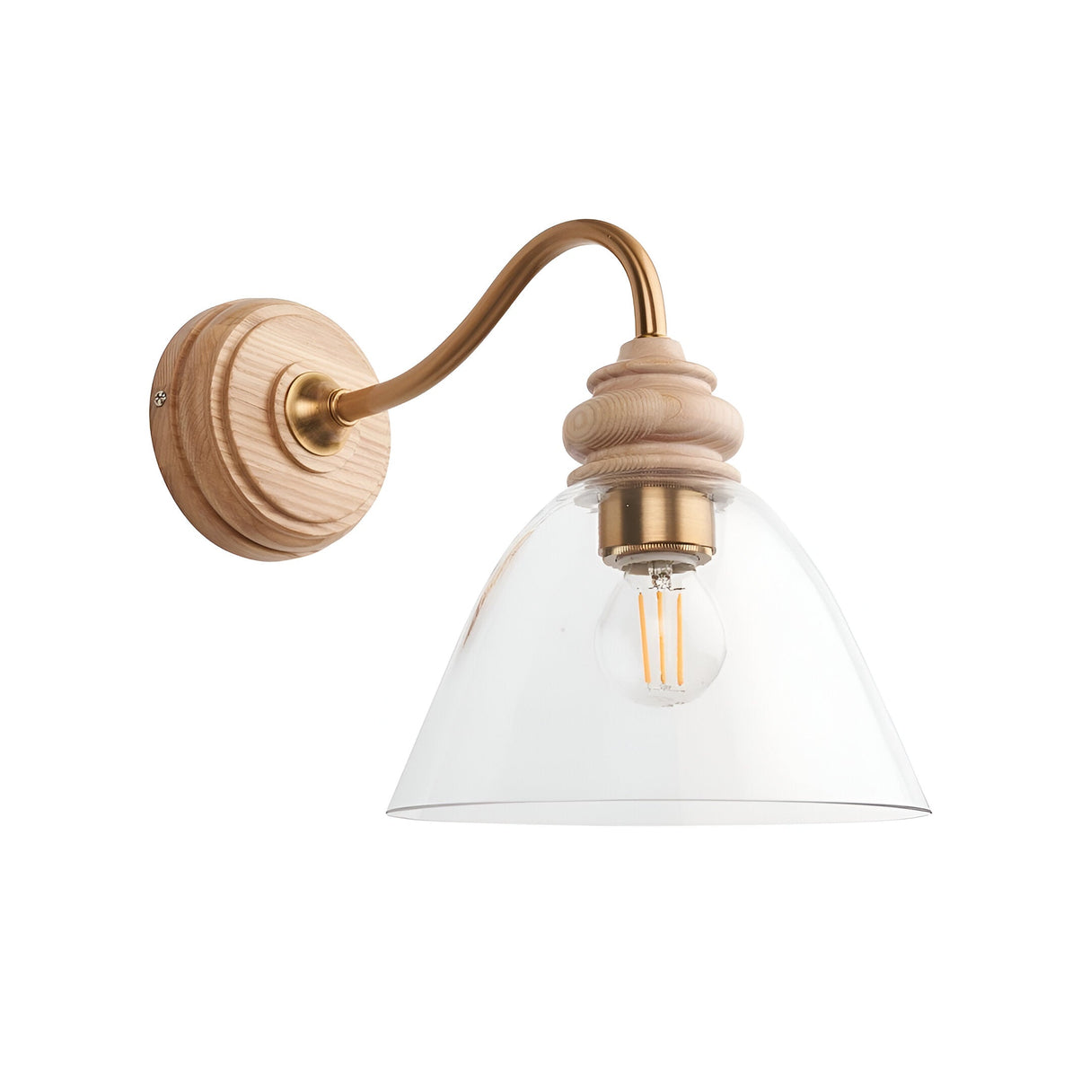 Endon Bevwick wall light with natural ash base, aged brass curved arm, and clear flared glass shade housing an E14 filament bulb, on a white background.