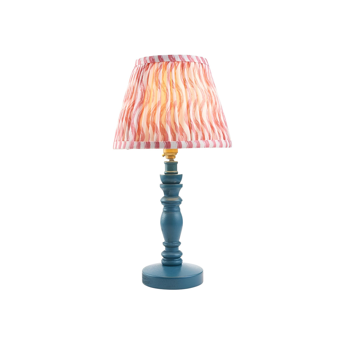 Endon Aldworth Ripple table lamp with turned marlin blue wooden spindle base, brass B22 lampholder and pleated coral pink ripple-print shade.