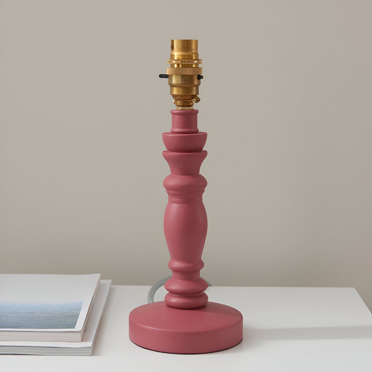 Aldworth Ripple table lamp base with turned wood spindle in soft pink clay finish and brass B22 lampholder.