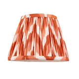 Aldworth Zigzag pleated table lamp shade in orange and white patterned faux silk, shown alone on a plain white background.