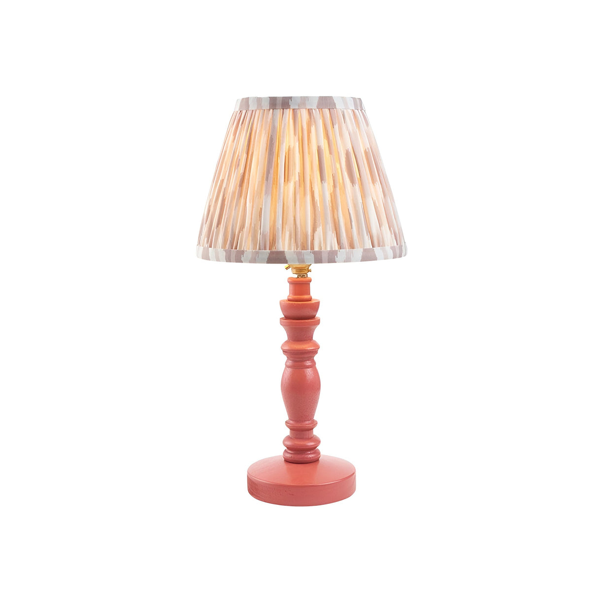 Endon Aldworth Ikat table lamp with pink clay turned wooden spindle base, brass lampholder and pleated ikat shade in grey and natural tones.