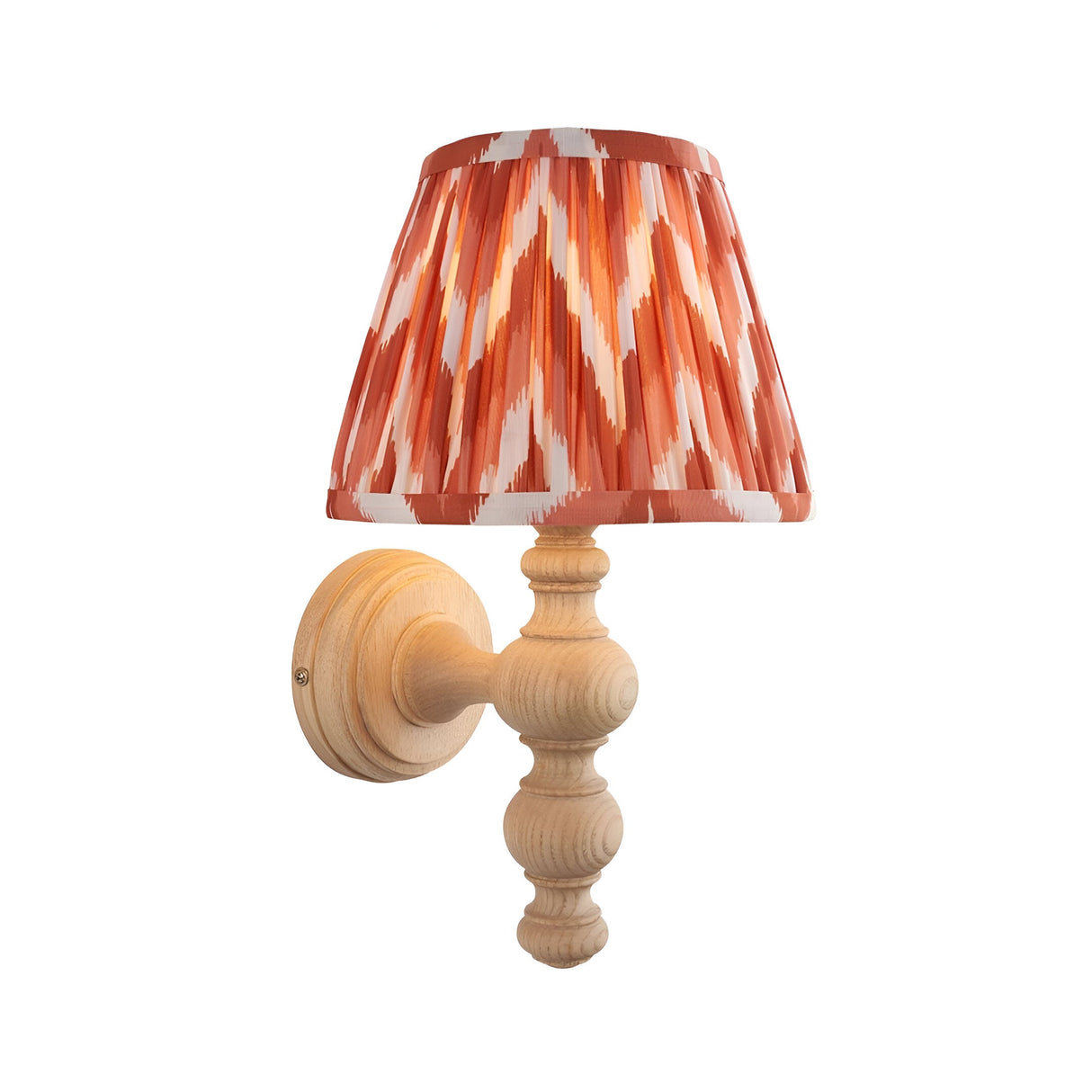 Aldworth Zigzag Wall Light in natural ash wood with turned spindle base and pleated apricot orange zigzag-patterned shade, shown on a plain white background.