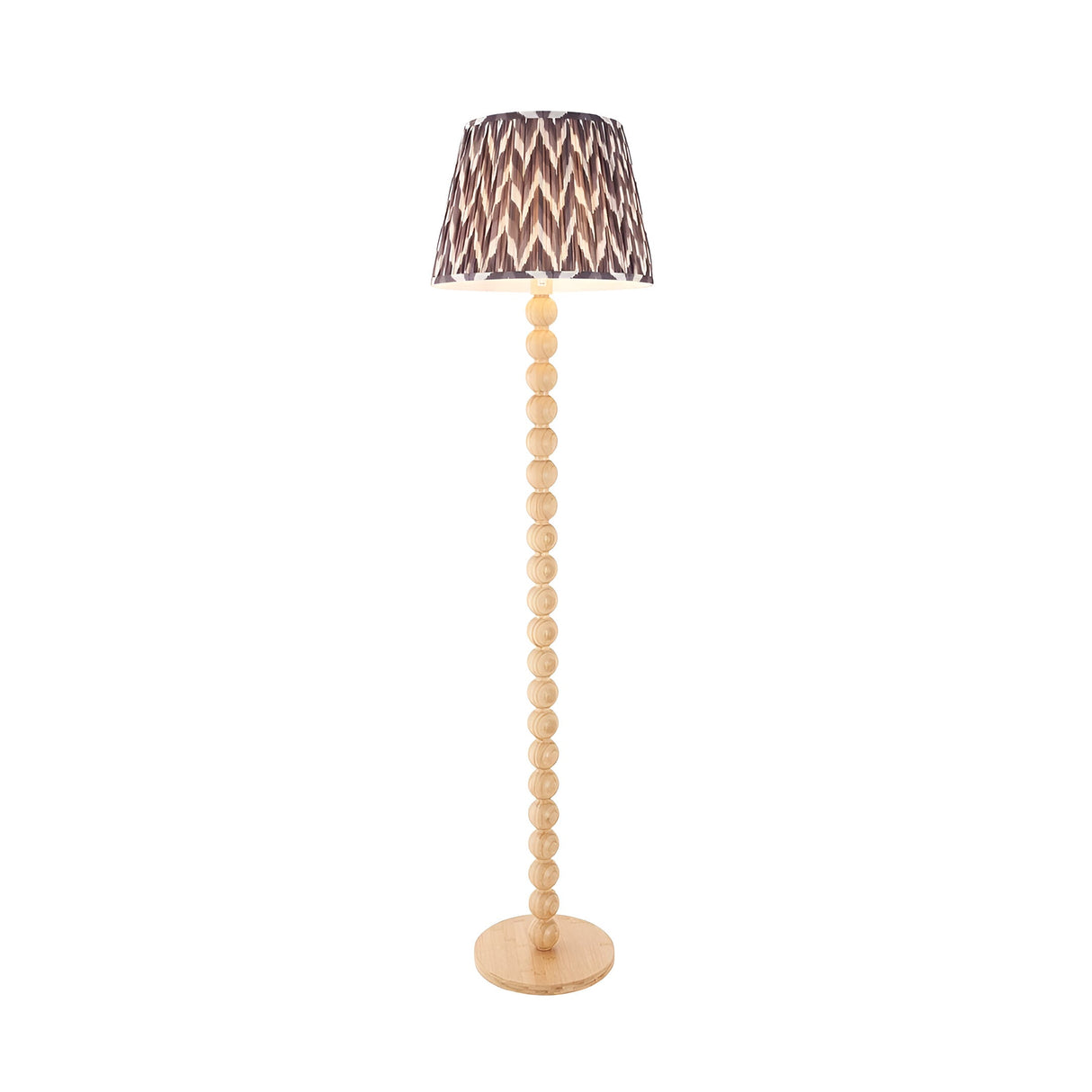 Ashwood Zigzag Floor Lamp with a stacked bamboo sphere base and tapered pearl grey zigzag pleated shade, shown on a plain white background.