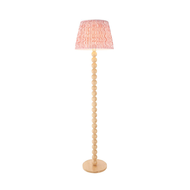 Endon Ashwood floor lamp with stacked natural bamboo sphere stem and coral pink pleated Ripple shade, shown on a plain white background.