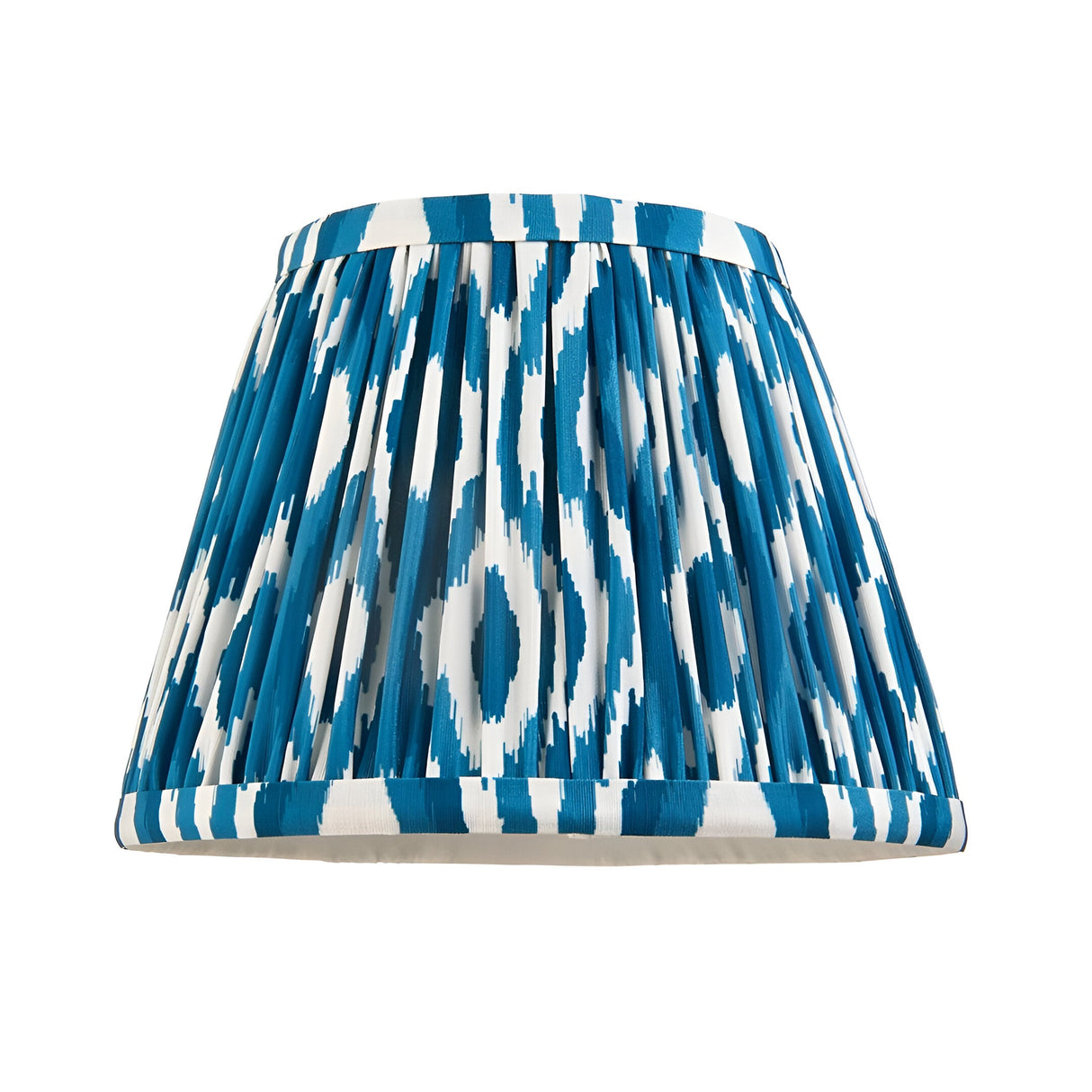 Bevbury Ikat wall light shade in blue and white patterned faux silk with pleated tapered design, shown against a plain white background.