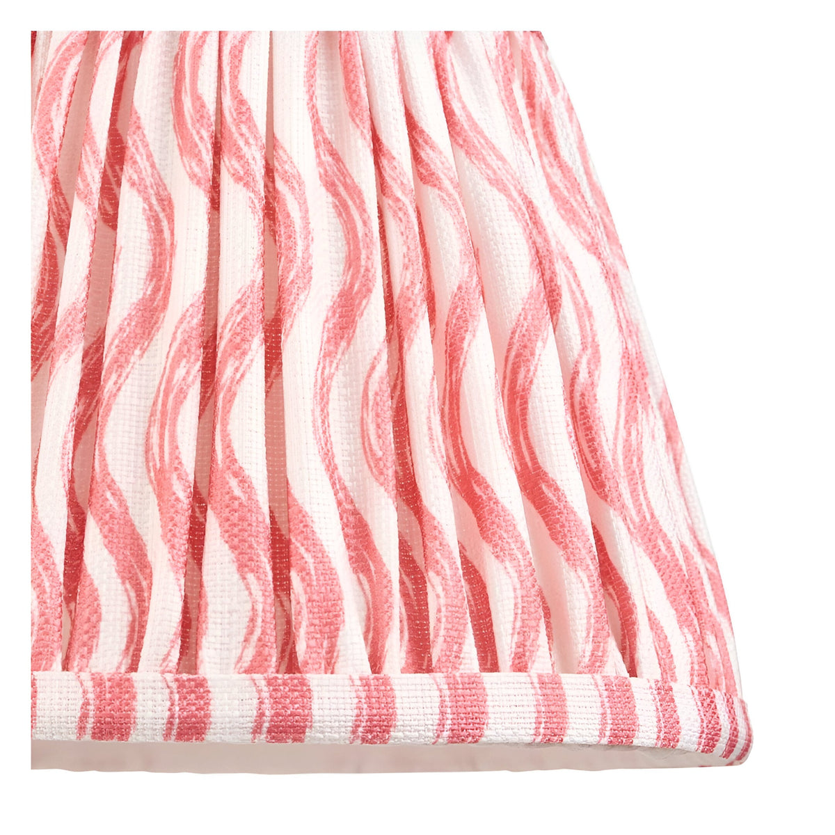 Close-up of the Endon Bevbury Ripple wall light shade in pleated faux linen with a pink and white rippling wave pattern and bound lower edge.