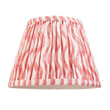 Endon Bevbury Ripple 20cm tapered gathered wall light shade in pink and white faux linen with rippling pattern, on a plain white background.