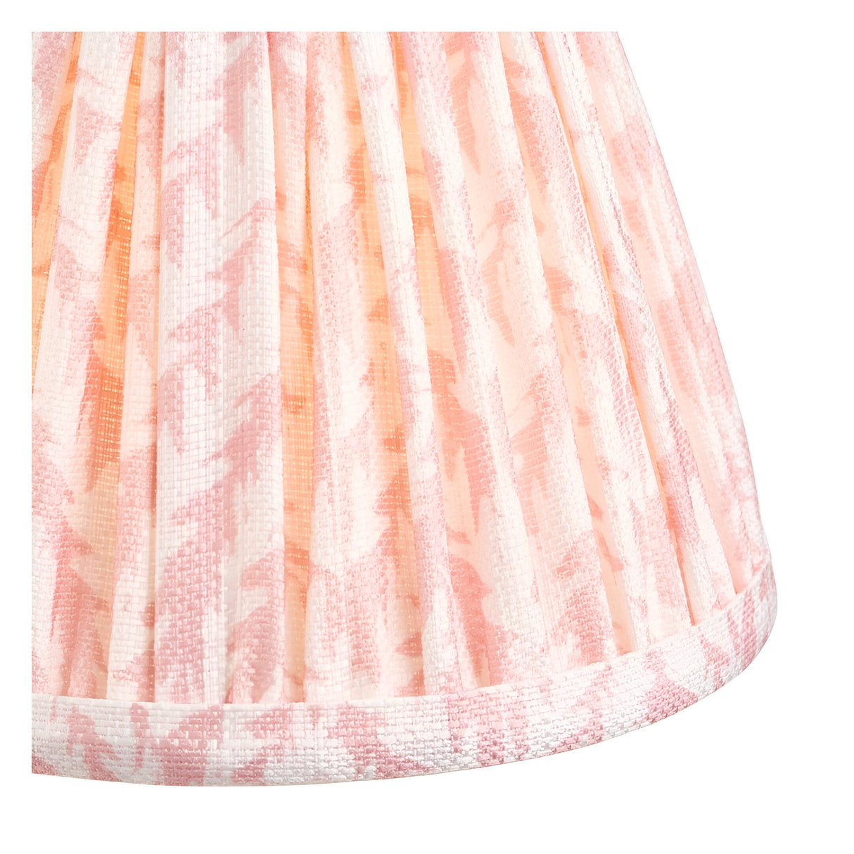 Close-up of the Endon Bevford pleated faux linen shade in peachy keen Leaf print with taped edge detailing, illuminated from within.