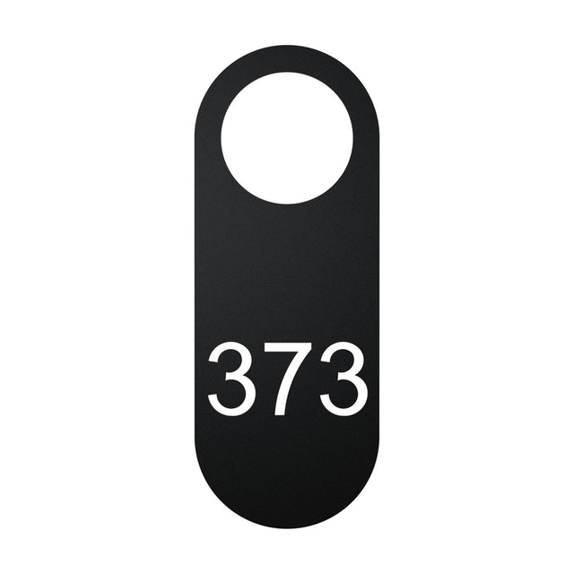 Blink Signage Tag for Wall Light in matt black iron, a pill-shaped plate with a round cut-out and "373" printed below, on a plain white background.