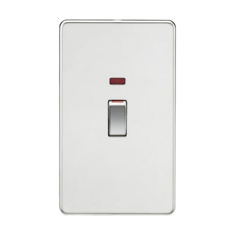 A 45A DP Switch Neon in a polished chrome, screwless design sits on the wall, featuring a small red rectangular indicator above it to signify its double pole capability. Resembling those used in cooker control units, it effectively manages power with an on/off status indication.