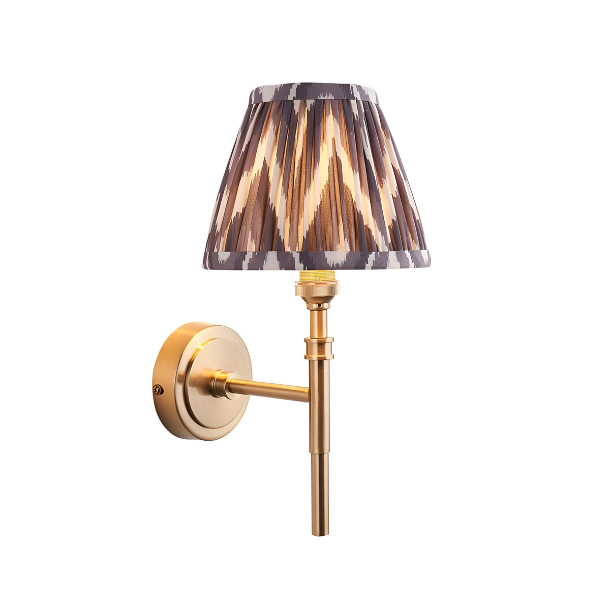 Endon Bevford Zigzag wall light in aged brass with a pleated grey faux silk tapered shade in zigzag print, shown on a plain white background.