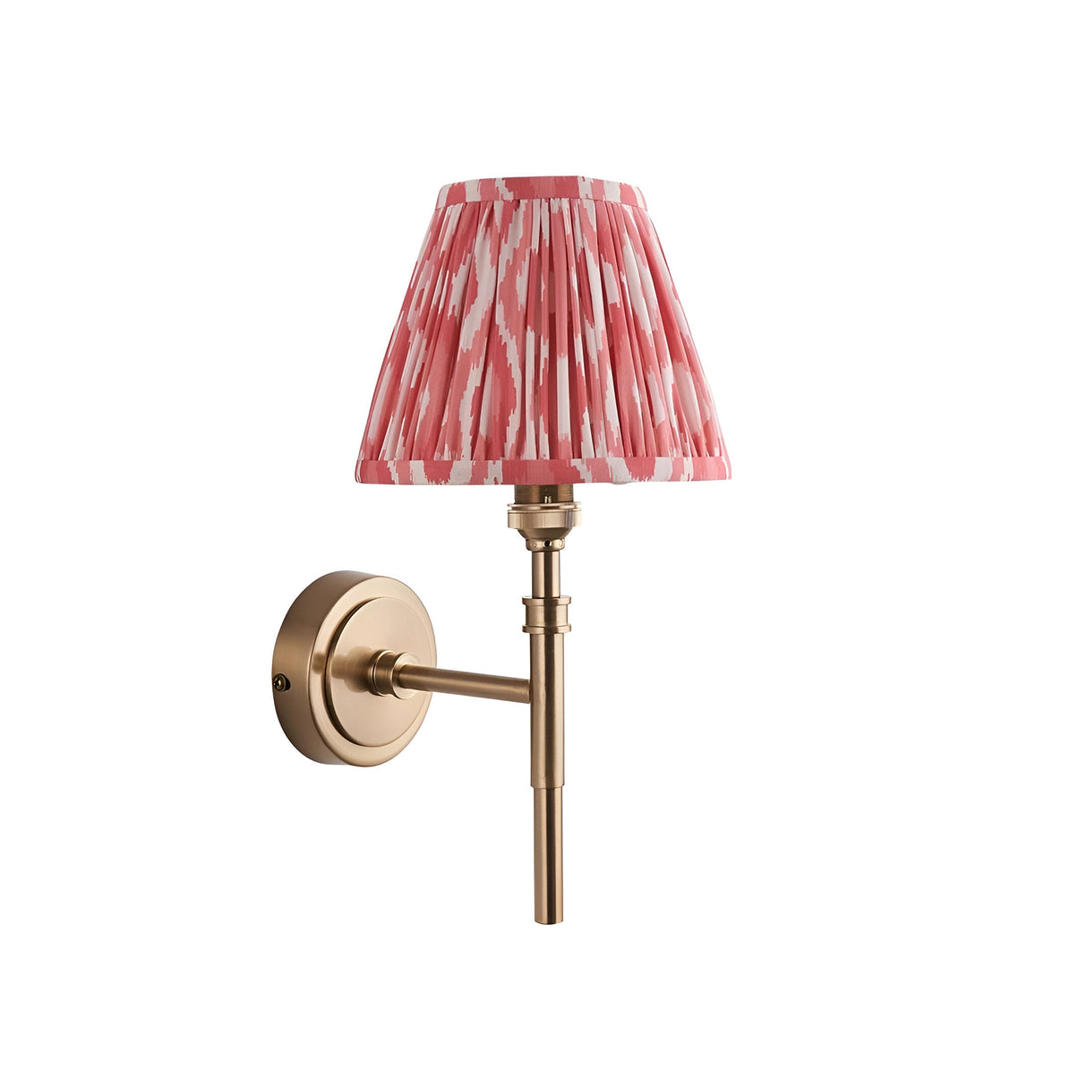Endon Bevford Ikat wall light in aged brass with a pleated tapered coral pink ikat faux silk shade, shown on a plain white background.