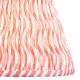 Close-up of the Endon Brenleigh Ripple table lamp's handmade pleated faux linen shade in white with pink wavy print and striped taped edge.