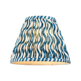 Endon Brenleigh Ripple pleated tapered table lamp shade in faux linen with blue wave print on cream, shown on a plain white background.