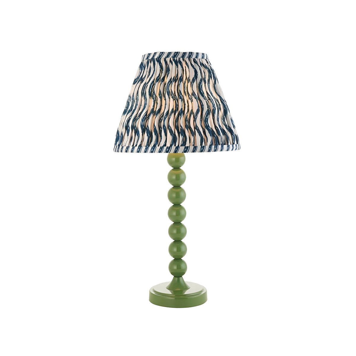 Endon Brenleigh Ripple table lamp with a green stacked-sphere metal base and blue and white pleated ripple fabric shade on a plain background.