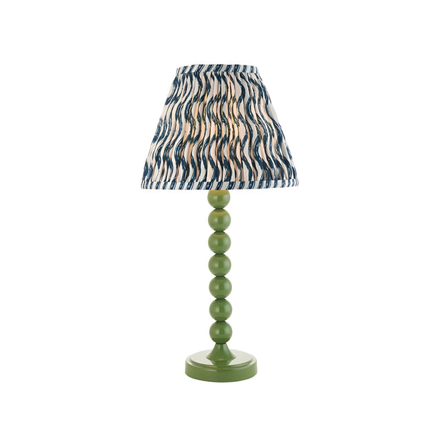 Endon Brenleigh Ripple table lamp with a green stacked-sphere metal base and blue and white pleated ripple fabric shade on a plain background.