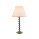 Brenleigh Ivy table lamp with a green stacked-sphere metal base and white cotton-mix Ivy shade with taped edge, on a plain white background.