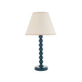 Brenleigh Ivy Table Lamp with a blue stacked-sphere metal base and white cotton-mix Ivy shade with taped edge, on a plain white background.