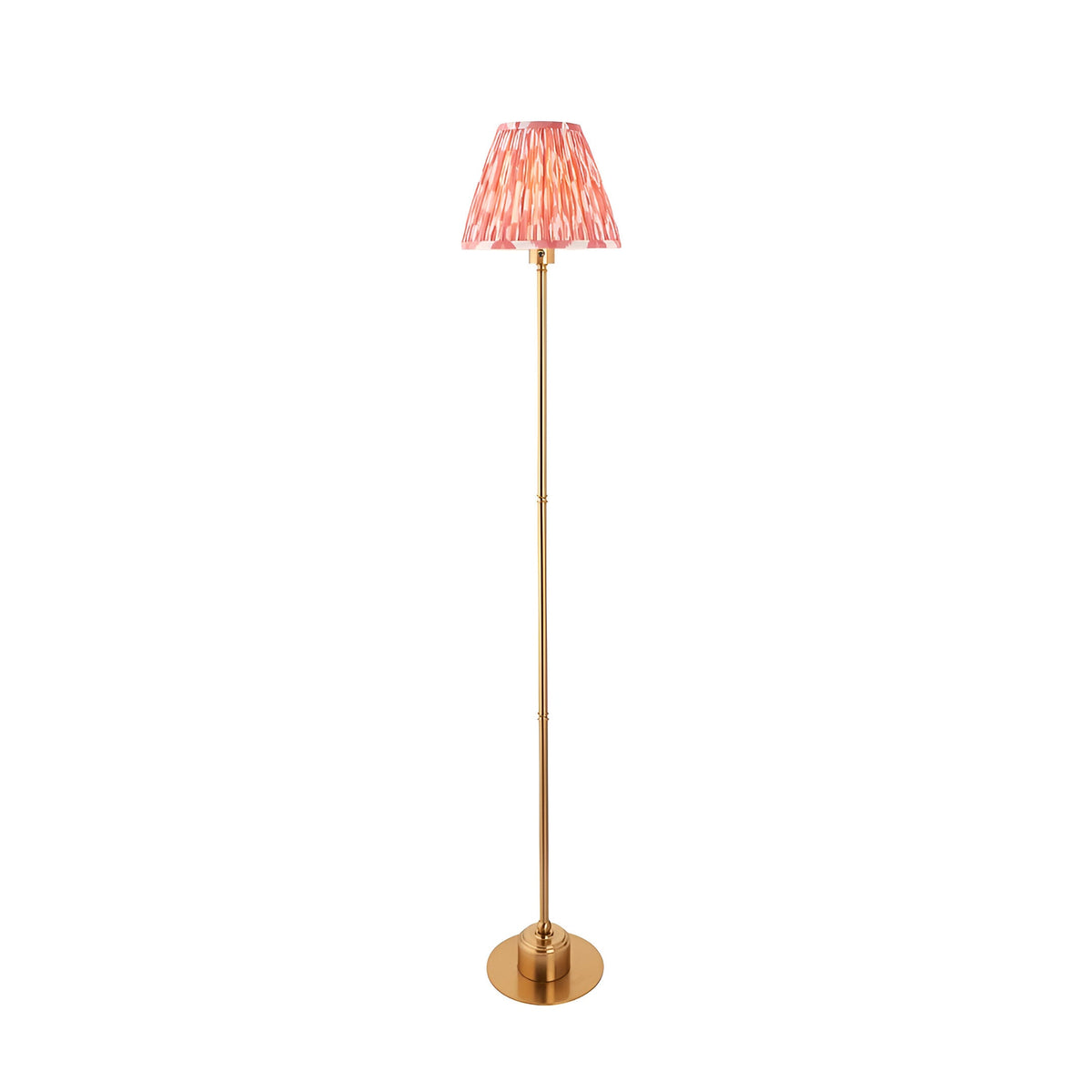 Endon Ashstead LED floor lamp with slim brushed brass stem and pleated pink Ikat fabric shade, shown on a plain white background.