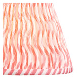 Close-up of the Endon Ashstead floor lamp's pleated Ripple shade in coral pink and white wavy print with taped striped edge trim.