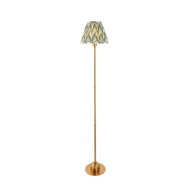 Endon Ashstead LED floor lamp with brushed brass stem and green zigzag pleated fabric shade, shown on a plain white background.