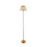 Endon Ashstead LED floor lamp with a brushed brass stem, round base, and pleated leaf-print fabric shade in neutral tones, on a white background.