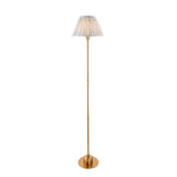 Ashstead LED Leaf Floor Lamp with slim brushed brass stem and pleated white and blue leaf-print fabric shade, on a plain white background.