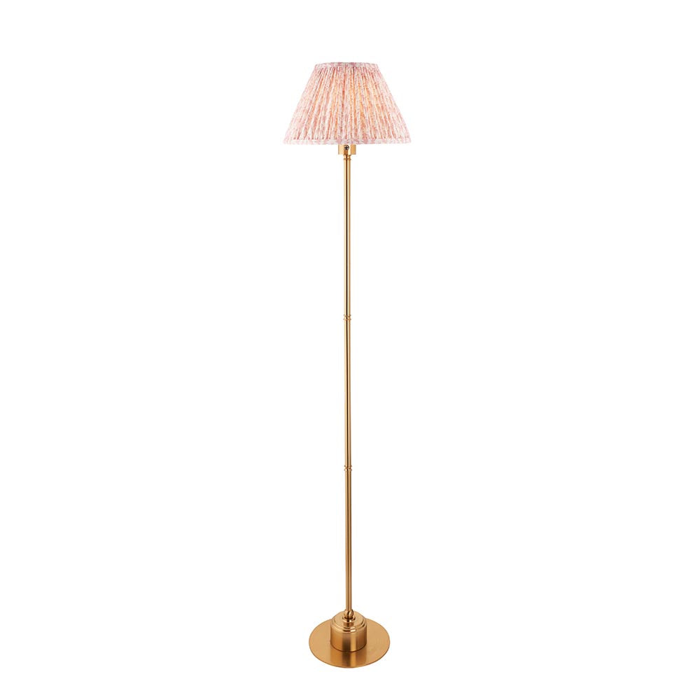 Ashstead LED Leaf Floor Lamp with slim brushed brass stem and pleated fabric shade in white, shown against a plain white background.