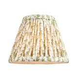 Ashstead LED Leaf Table Lamp with pleated cream fabric shade featuring a green leaf pattern, shown on a plain white background.