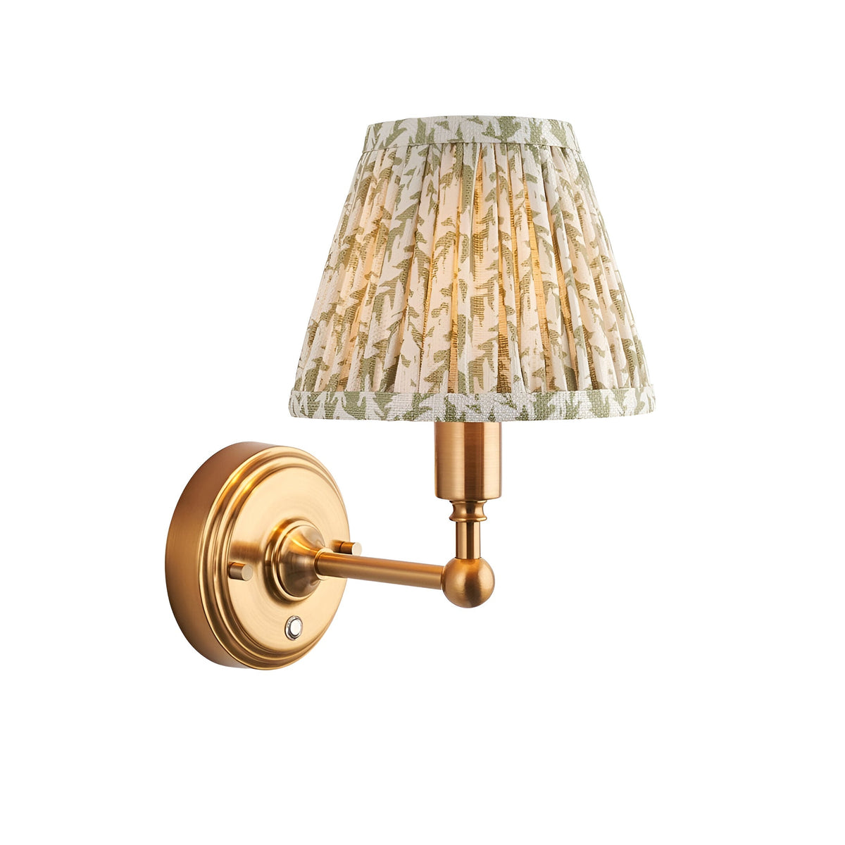 Endon Ashstead LED wall light with pleated green leaf-print faux linen shade on a brushed aged brass arm and round backplate, on white.