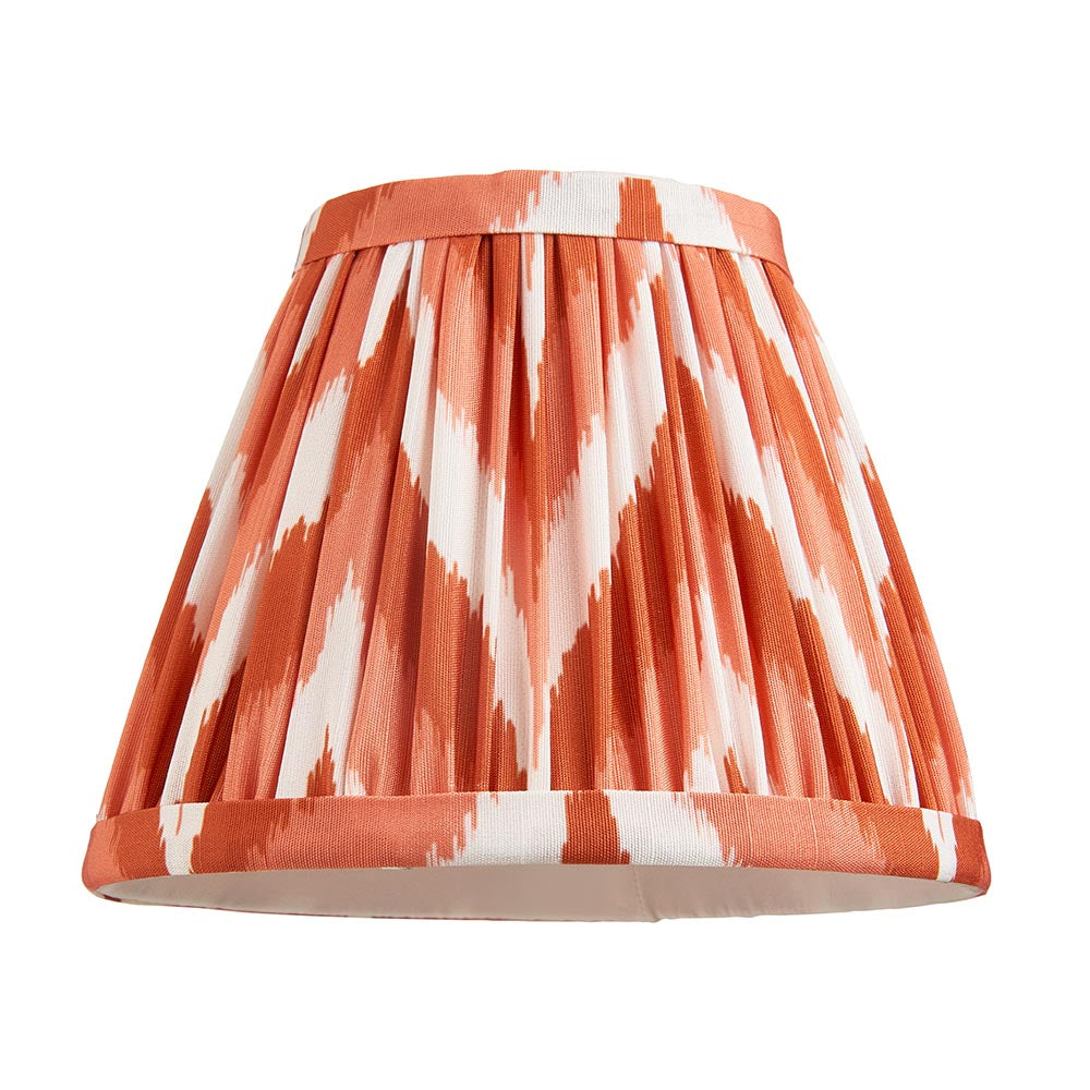 Ashstead LED Zigzag wall light with pleated orange and white patterned fabric shade, brass fittings, shown on a plain white background.