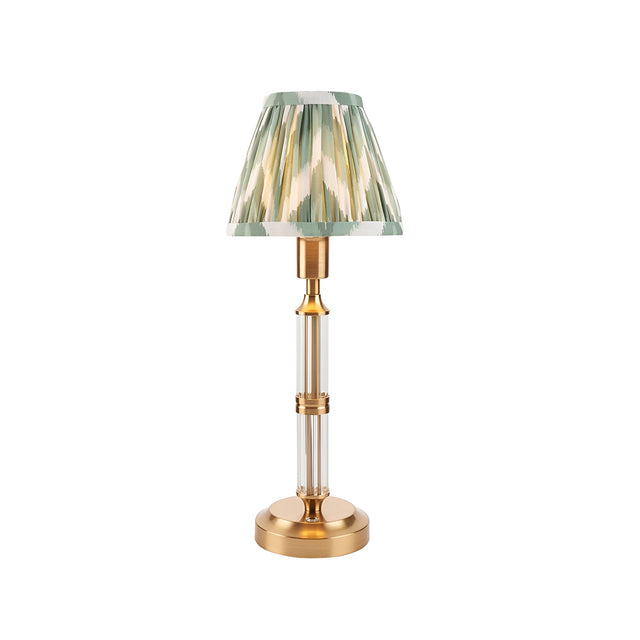 Carlwood LED Table Lamp with brushed aged brass base, clear acrylic column, and pleated Cotswold green zigzag fabric shade, shown on a plain white background.