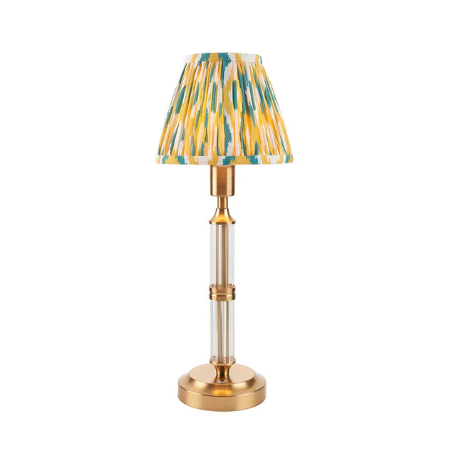 Carlwood LED table lamp with a pleated Ikat-print shade in yellow, teal and white, brass column base and stem, shown on a plain white background.