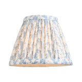 Endon Cranwick LED Leaf table lamp shade in pleated faux linen with blue and white leaf print, shown on a plain white background.