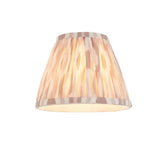 Cranwick LED Ikat table lamp with pleated cone shade in natural, white and brown striped fabric, shown lit against a plain white background.