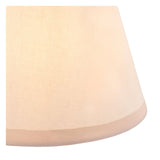 Close-up of the Danebourne LED rechargeable table lamp's fabric shade and lower brass trim edge.