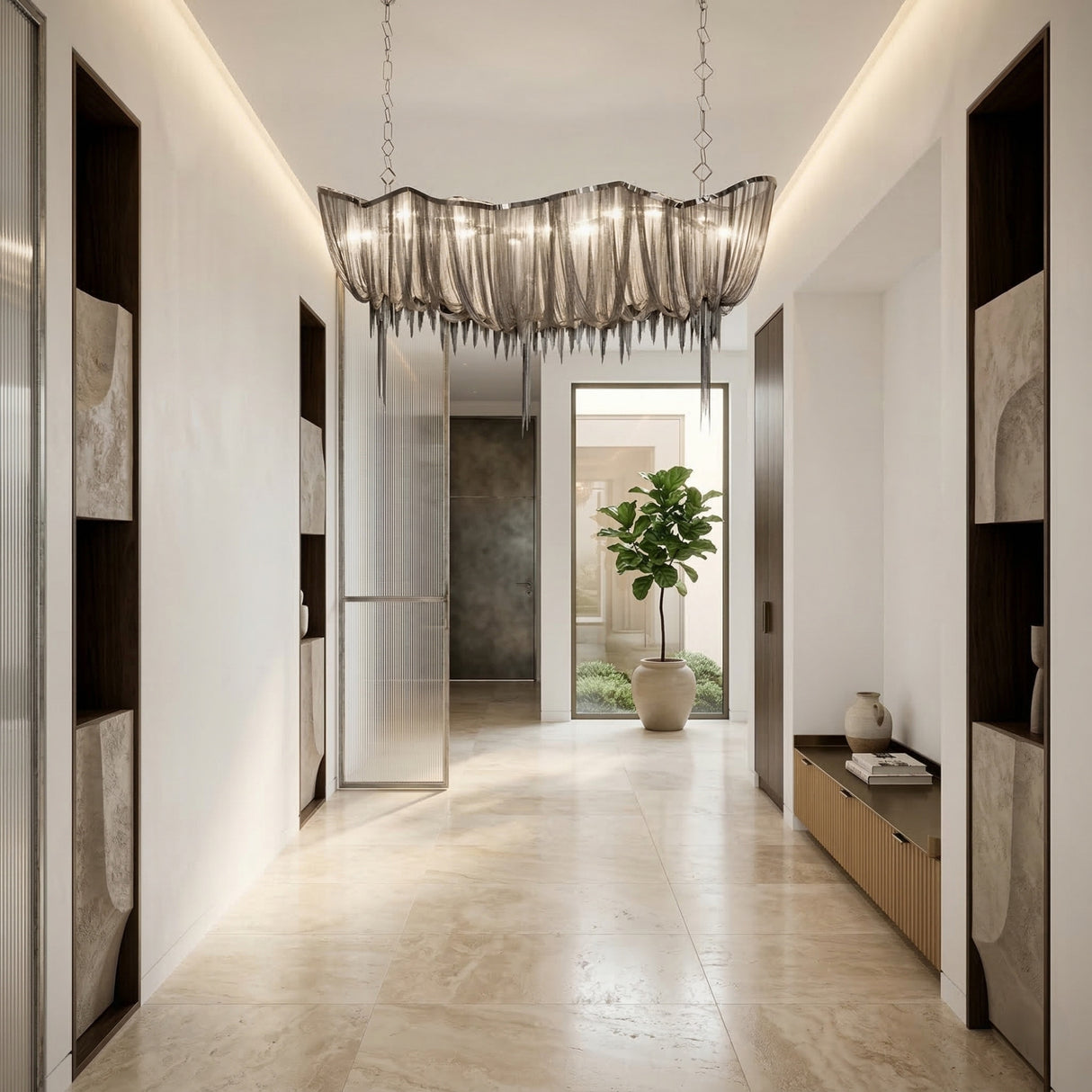 Mireya 8 Light Chain Veil Chandelier in nickel suspended on square-link chains above a bright hallway with travertine floor and potted fiddle-leaf fig.