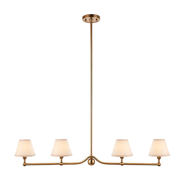 Endon Cliffleigh 4 light linear bar pendant in brushed aged brass with four tapered white cotton mix shades, shown on a plain white background.
