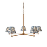 Cliffleigh 5-Light Ripple Pendant in Blue with tapered wavy blue-and-cream fabric shades on a brushed brass frame with chain suspension.