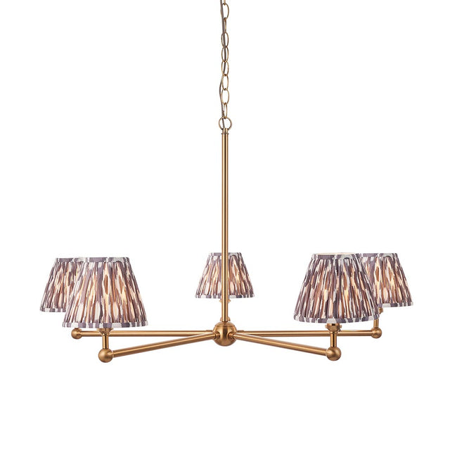 Cliffleigh Ikat 5 Light Pendant with brushed brass frame and pleated grey Ikat-patterned fabric shades, hung from a chain on a white background.