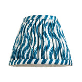 Endon Cliffleigh Ripple pleated tapered shade in marlin blue faux linen with wavy ripple pattern and taped edge, shown on a plain white background.