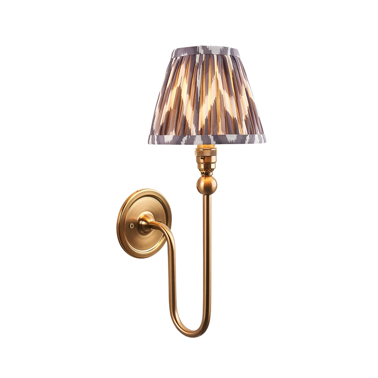 Endon Cliffleigh Zigzag wall light with brushed aged brass curved arm and pleated pearl grey zigzag print tapered shade on a plain background.