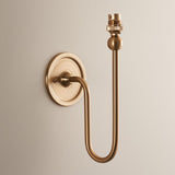 Endon Cliffleigh Leaf II wall light base in brushed aged brass, showing the curved arm, round wall plate and B22 lamp holder against a neutral background.