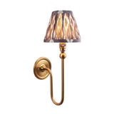 Cliffleigh Ikat Wall Light II in brushed brass with a pleated grey and beige Ikat-pattern fabric shade, shown on a plain white background.
