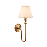 Cliffleigh Ivy Wall Light in brushed aged brass with a tapered vintage white fabric shade, single B22 fitting, shown on a plain white background.
