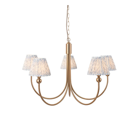 Endon Cliffleigh Leaf 5 light pendant with curved brushed brass arms and tapered blue and grey leaf-print fabric shades, on a chain suspension.